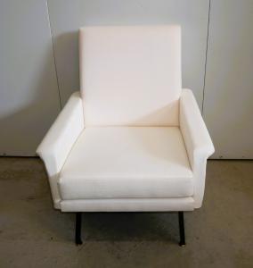 Restored 1960s armchair. Italian vintage furniture.